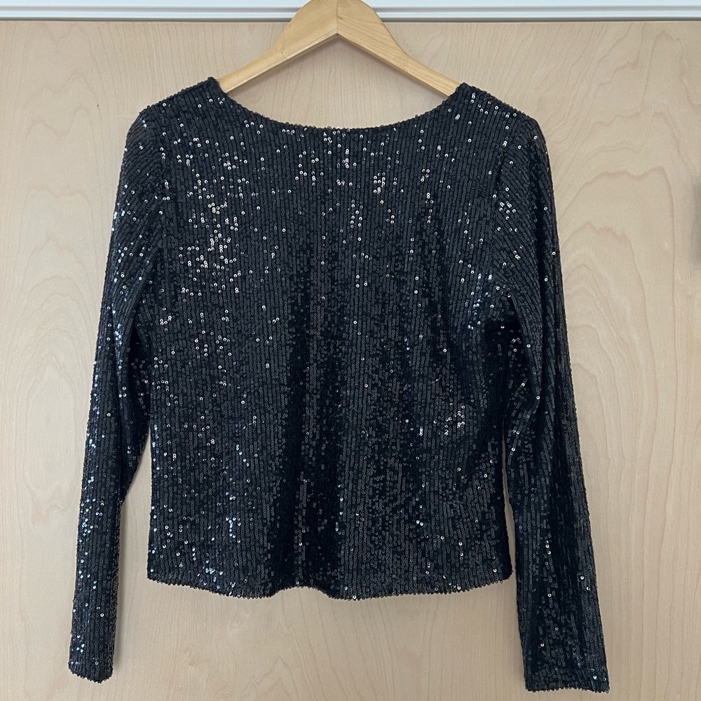 Nordstrom’s black sequins scoop back top